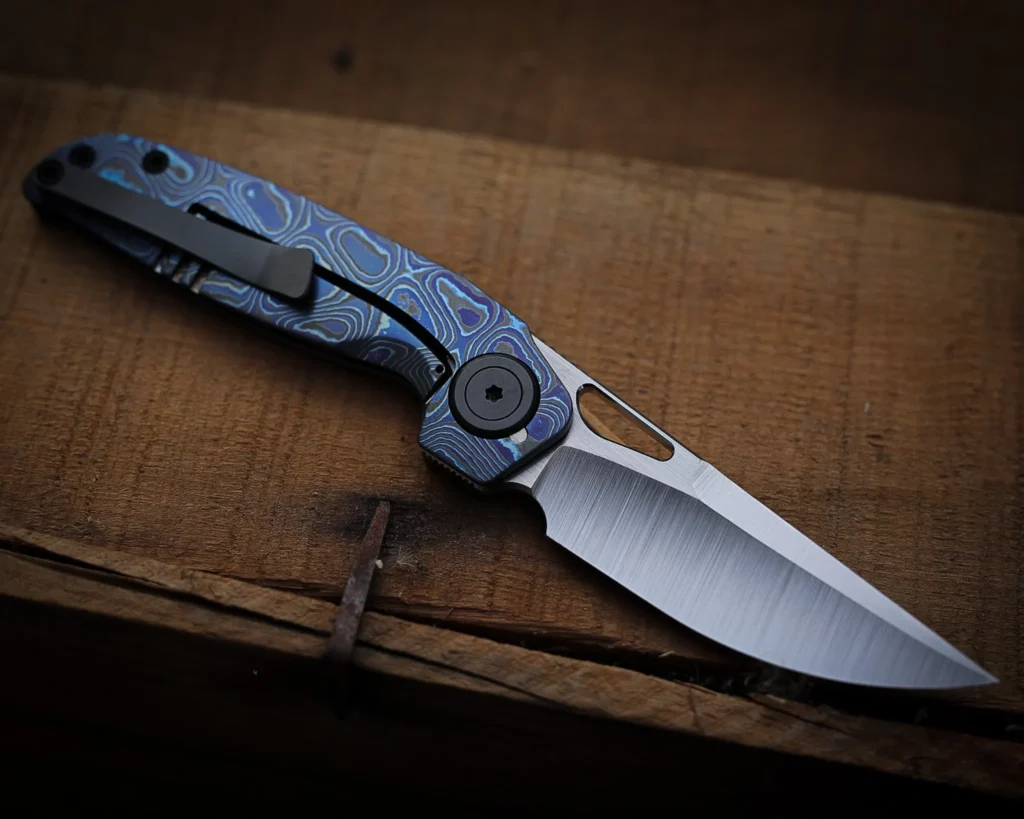 Full Zircuti Transient Framelock Custom - S45-VN belt satin blade, matte zircuti frames and satin zirc pivots/screws, backspacer and clip.
